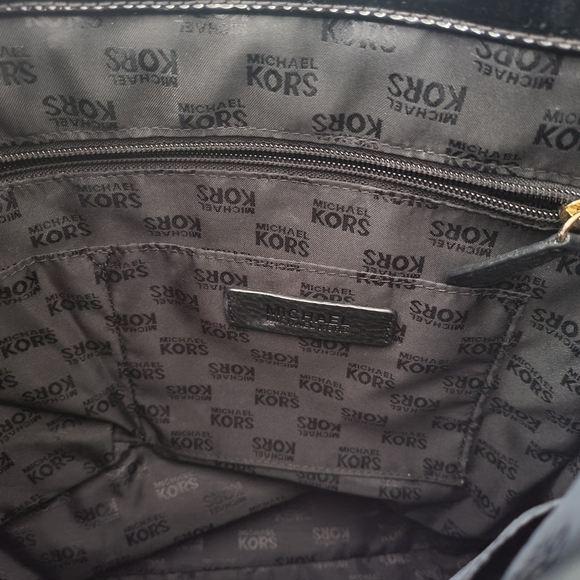 Shiny Black MK Logo Purse Made by Michael Kors with gold accents